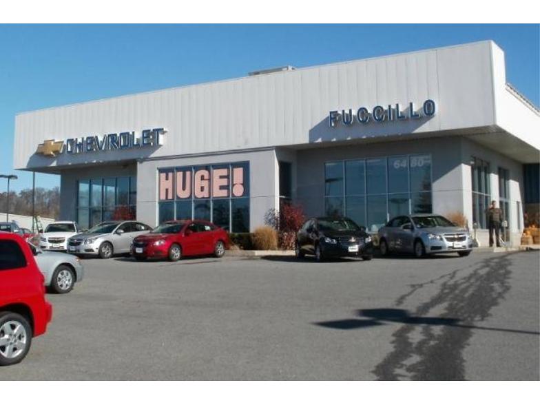 What services are offered by Fuccillo car dealership in Amsterdam, NY?