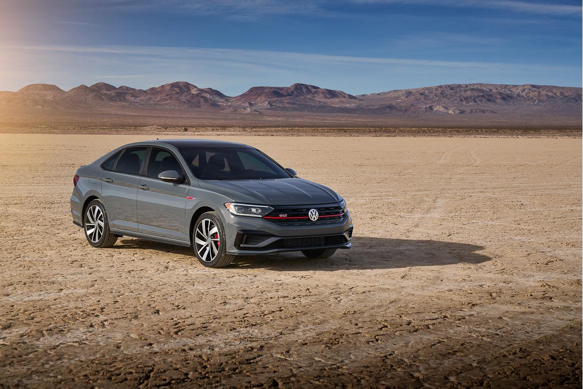 04-<a href=https://www.sharperedgeengines.com/used-volkswagen-engines>volkswagen</a>-jetta-gli-2019-angle--desert--exterior--front--gre