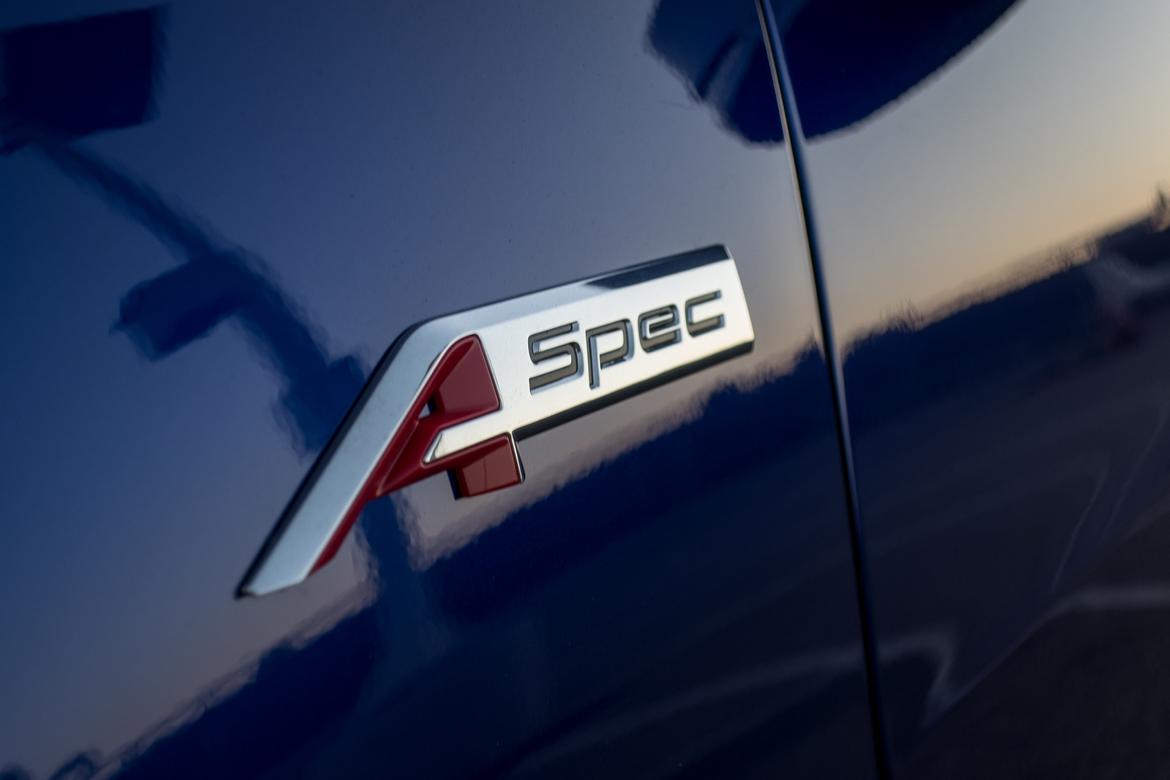 22-acura-tlx-a-spec-2018-badge-blue-exterior-grille.jpg