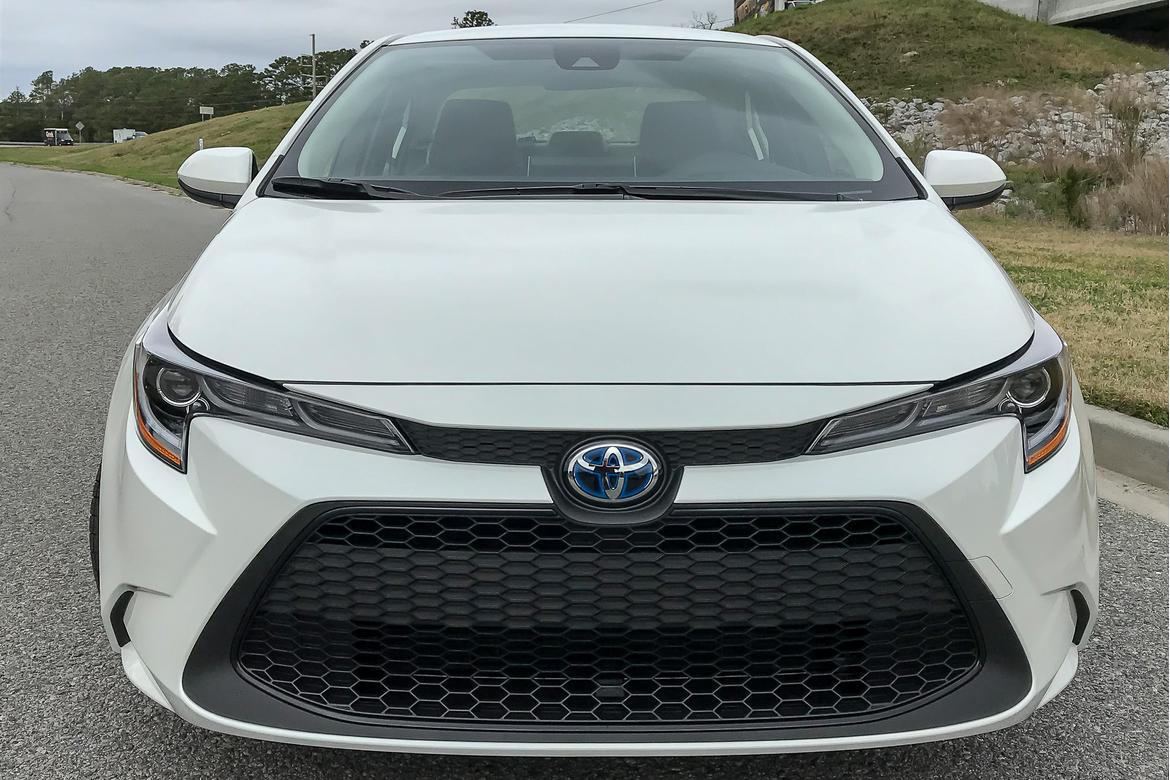 14-<a href=https://www.sharperedgeengines.com/used-toyota-engines>toyota</a>-corolla-2020-exterior--front--white.jpg