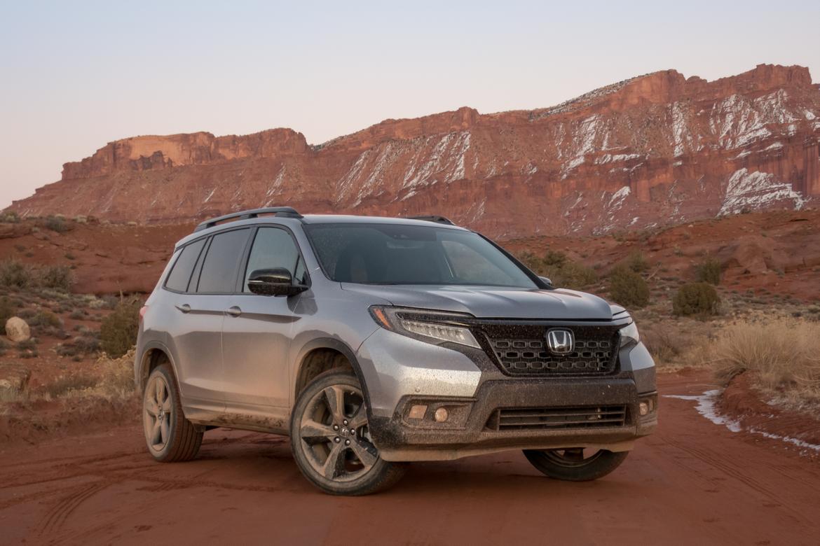 01-<a href=https://www.sharperedgeengines.com/used-honda-engines>honda</a>-passport-2019-angle--exterior--front--mountain--off-roa