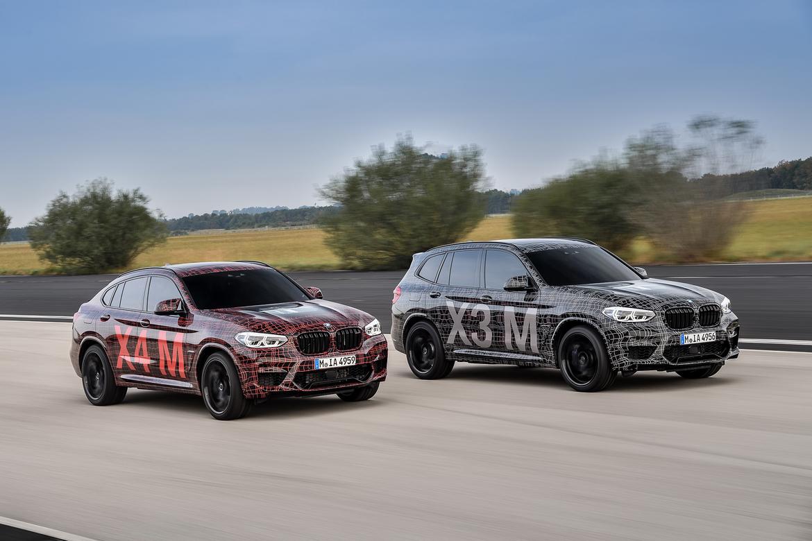 02-<a href=https://www.sharperedgeengines.com/used-bmw-engines>bmw</a>-x3-m-and-x4-m-prototype-angle--black--front--head-to-head