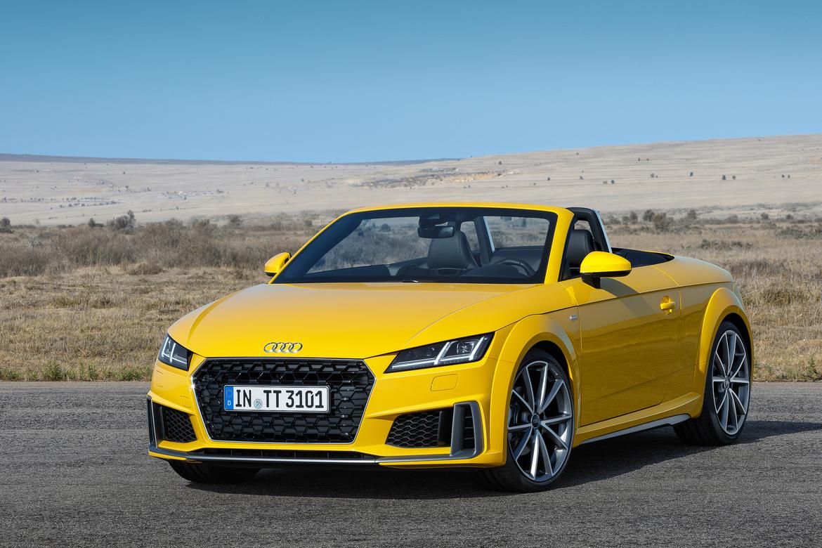 07-<a href=https://www.sharperedgeengines.com/used-audi-engines>audi</a>-tt-angle--exterior--front--outdoors--yellow.jpg