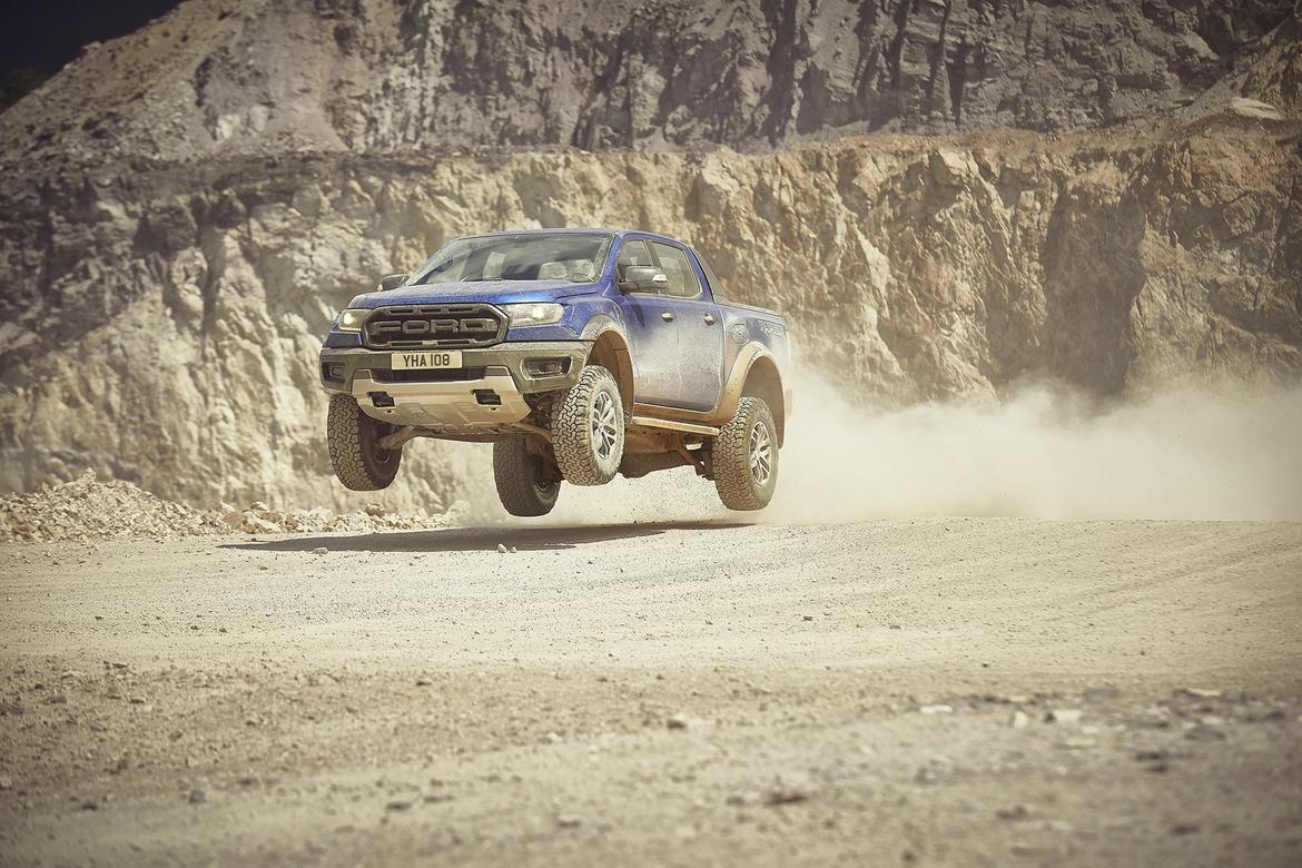 2018_<a href=https://www.sharperedgeengines.com/used-ford-engines>ford</a>_ranger_raptor_wildtrak_shot9_34frontdynamic_jump_01.jp