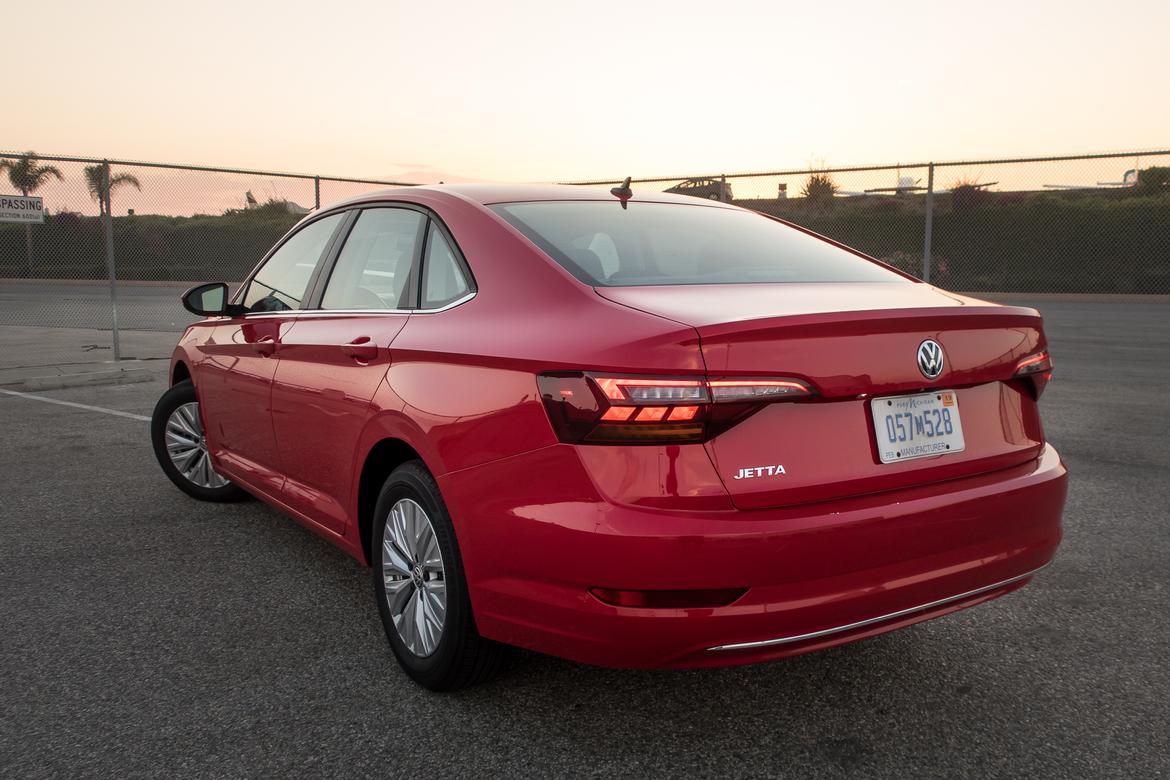 04-<a href=https://www.sharperedgeengines.com/used-volkswagen-engines>volkswagen</a>-jetta-2019-exterior--rear-angle--red.jpg