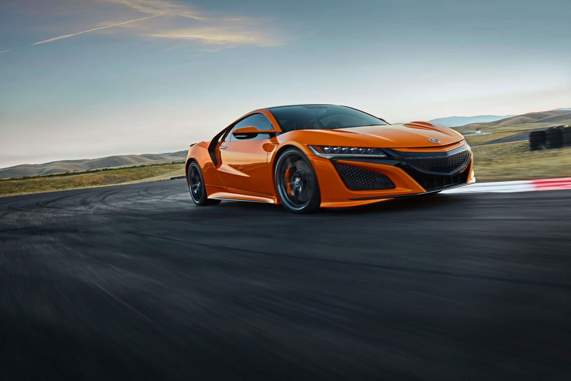 01-<a href=https://www.sharperedgeengines.com/used-acura-engines>acura</a>-nsx-2019-angle--dynamic--exterior--front--orange.jpg