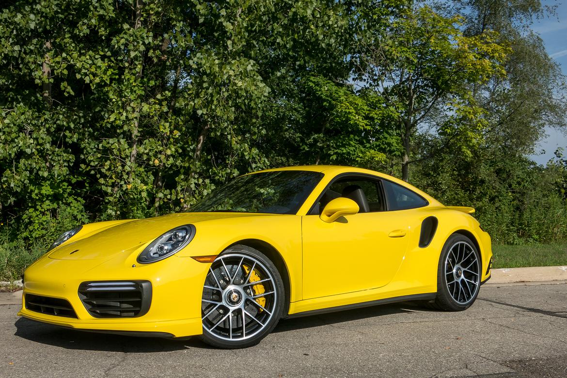 01-<a href=https://www.sharperedgeengines.com/used-porsche-engines>porsche</a>-911-turbo-s-2018-angle--exterior--front--yellow.jpg