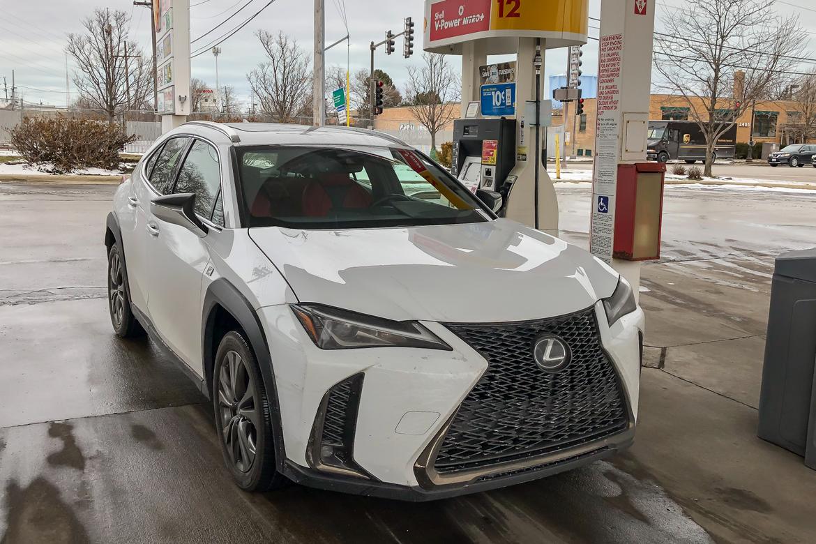 02-<a href=https://www.sharperedgeengines.com/used-lexus-engines>lexus</a>-ux-2019-angle--exterior--front--gas-station--white.jpg