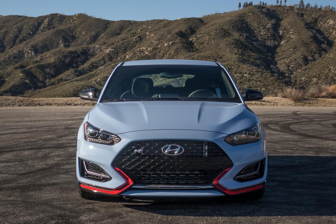 03-<a href=https://www.sharperedgeengines.com/used-hyundai-engines>hyundai</a>-veloster-n-2019-blue--exterior--front--orange.jpg