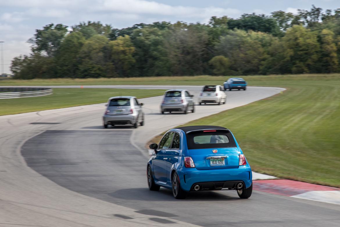 07-fiat-500-abarth-2018-blue--dynamic--exterior--rear--track.jpg